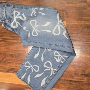 Ashley Mason Blue Jeans with White Bow Design